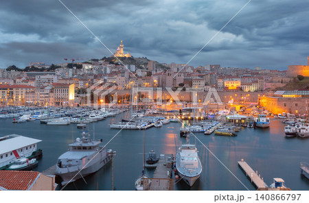 Marseille Old Port marina at blue hour with Notre-Dame de la Garde, France Marseille Old Port marina at blue hour with Notre-Dame de la Garde, France 140866797