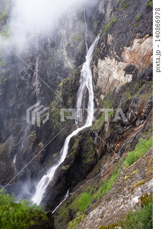 Voringsfossen waterfall, one of the most famous in Norway. Located between the Hardangerfjord and the Hardangervidda plateau Voringsfossen waterfall, one of the most famous in Norway. Located between the Hardangerfjord and the Hardangervidda plateau 140866978