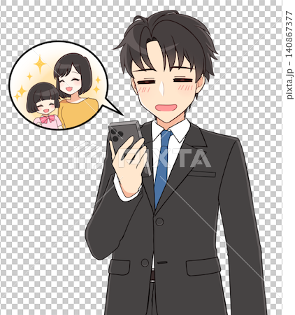 A young, handsome man in a suit grins as he looks at a family photo. A young, handsome man in a suit grins as he looks at a family photo. 140867377