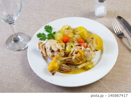 Stewed piece of chicken with potato and carrot Stewed piece of chicken with potato and carrot 140867417