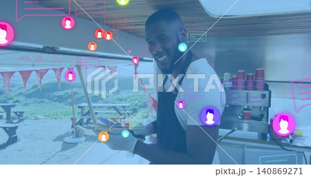Serving barista wearing dark apron gloves making coffee at coastal picnic with red cups chat icons 140869271