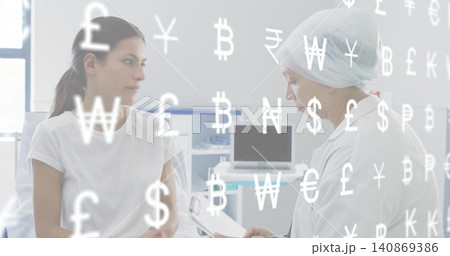 Sitting patient white tee, doc white coat surgical cap noting clipboard in clinic, currency overlay Sitting patient white tee, doc white coat surgical cap noting clipboard in clinic, currency overlay 140869386