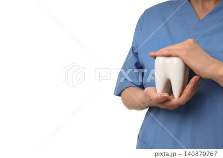 Dentist highlights tooth model for patients, isolated on white, PNG 140870767