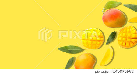 Ripe mangoes and slices arranged beautifully on sunny background. Fresh fruit concept Ripe mangoes and slices arranged beautifully on sunny background. Fresh fruit concept 140870966