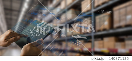 man hold a transparent tablet in a warehouse, monitoring inventory and logistics data through an AI dashboard for stock tracking, shipment analysis, and supply chain management tasks. man hold a transparent tablet in a warehouse, monitoring inventory and logistics data through an AI dashboard for stock tracking, shipment analysis, and supply chain management tasks. 140871126