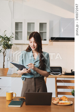 Young adult asian business woman using laptop chat digital artificial intelligence assistance ai chatbot prompt analysis work modern lifestyles Young adult asian business woman using laptop chat digital artificial intelligence assistance ai chatbot prompt analysis work modern lifestyles 140872047