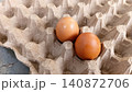 Close up of two fresh eggs in a tray. 140872706