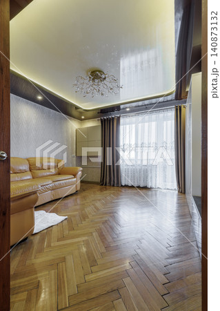 View Through Doorway into Bright Apartment Living Room Interior View Through Doorway into Bright Apartment Living Room Interior 140873132