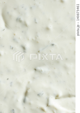 Creamy mayonnaise dressing with chopped herbs top view 140873461