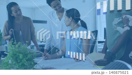 Reviewing four women wearing workwear at office, marking plans with pens, plant left, data overlays Reviewing four women wearing workwear at office, marking plans with pens, plant left, data overlays 140875021