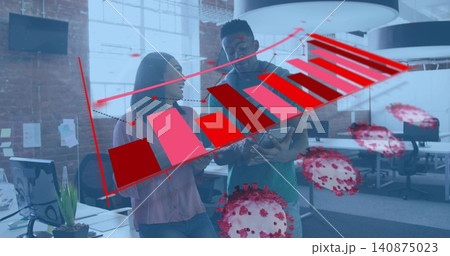 Examining coworkers pointing at tablet in modern office, business casual, red chart, virus overlays Examining coworkers pointing at tablet in modern office, business casual, red chart, virus overlays 140875023