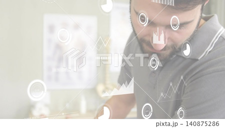 Leaning, male with short beard wearing grey polo studying holographic charts in clinic, copy space Leaning, male with short beard wearing grey polo studying holographic charts in clinic, copy space 140875286