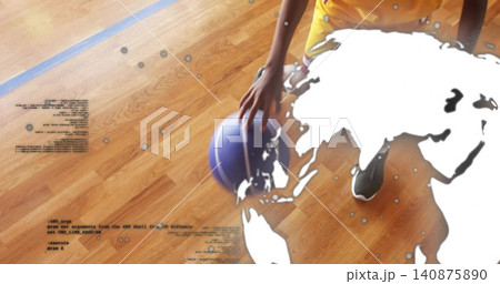 Teenage athlete in yellow top placing hand on purple basketball on court, map overlay, copy space 140875890