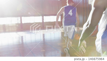 Running player in blue jersey 4 white shorts moving downcourt to baseline, ball blur, copy space Running player in blue jersey 4 white shorts moving downcourt to baseline, ball blur, copy space 140875964
