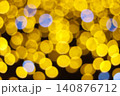 Golden yellow abstract bokeh lights background with soft blue circles for celebration festive wallpaper 140876712