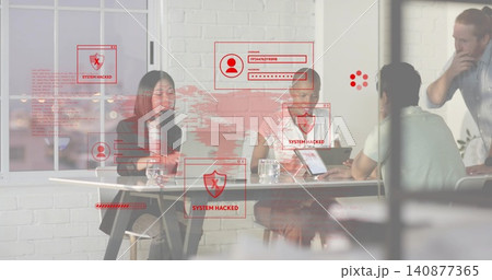 Viewing four colleagues in business attire using laptops at meeting table, displaying SYSTEM HACKED Viewing four colleagues in business attire using laptops at meeting table, displaying SYSTEM HACKED 140877365