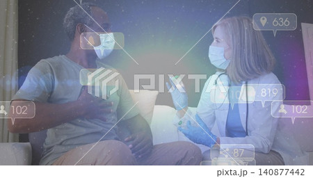 Showing clinician holding vial while patient holding chest at home, with white coat and stethoscope 140877442