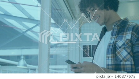 Holding smartphone, man wearing plaid shirt, white tee, backpack strap, viewing overlay at atrium Holding smartphone, man wearing plaid shirt, white tee, backpack strap, viewing overlay at atrium 140877678