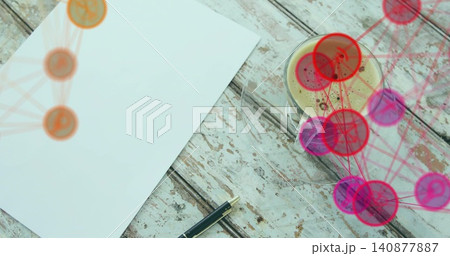 Showing blank sheet lying angled on worn table with fountain pen, coffee mug and tech overlays Showing blank sheet lying angled on worn table with fountain pen, coffee mug and tech overlays 140877887