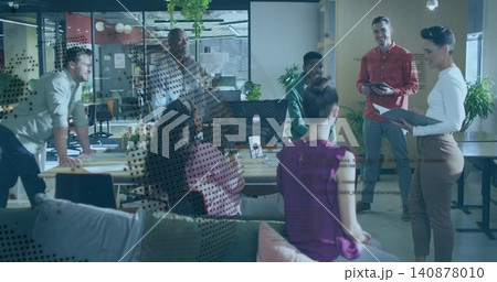 Presenting woman in white top tan pants holding folder and leading meeting with monitor, copy space Presenting woman in white top tan pants holding folder and leading meeting with monitor, copy space 140878010