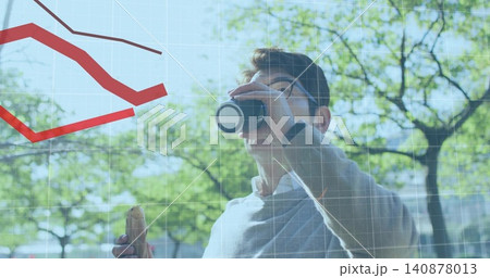 Drinking man standing outdoors in shirt, sweater, glasses, holding mug and sandwich, data overlay 140878013