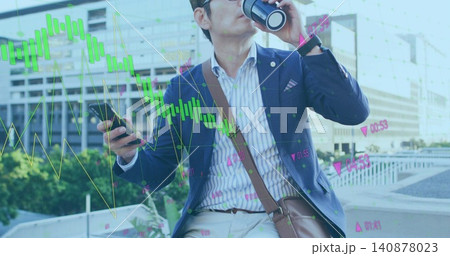 Drinking man in navy blazer checking phone while sipping travel mug on terrace, financial charts Drinking man in navy blazer checking phone while sipping travel mug on terrace, financial charts 140878023