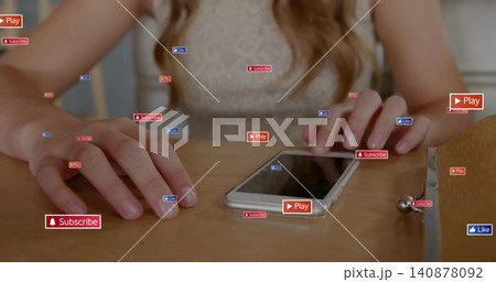 Touching woman's phone, wearing lace top at table at home, with floating overlays and clutch Touching woman's phone, wearing lace top at table at home, with floating overlays and clutch 140878092
