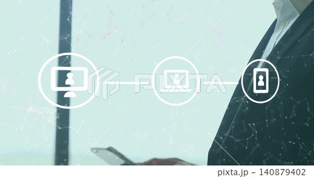Holding manager in dark suit checking phone near office window, sync icons, copy space Holding manager in dark suit checking phone near office window, sync icons, copy space 140879402