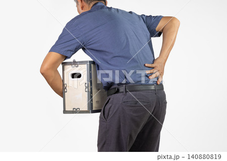 Senior man feeling backache because lifting weight box. Senior man feeling backache because lifting weight box. 140880819