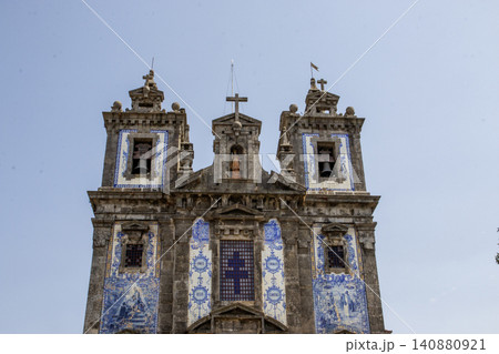 Close up of the Top of the Church of Saint Ildefonso n Porto Portugal With Blue Tiles and Bell Towers Close up of the Top of the Church of Saint Ildefonso n Porto Portugal With Blue Tiles and Bell Towers 140880921