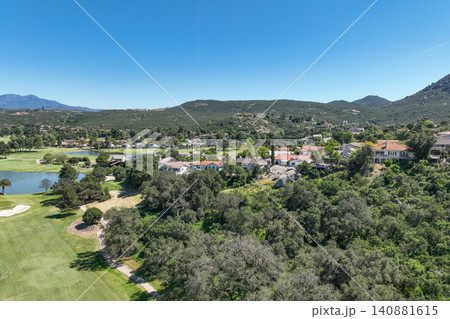 Aerial view of Ramona neighborhood with mountain, valley and golf course Aerial view of Ramona neighborhood with mountain, valley and golf course 140881615
