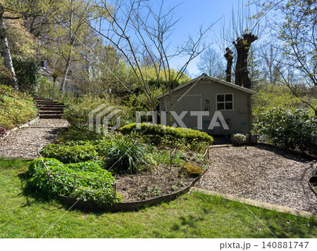 Enlgish green garden with multpiple type of trees and plants Enlgish green garden with multpiple type of trees and plants 140881747
