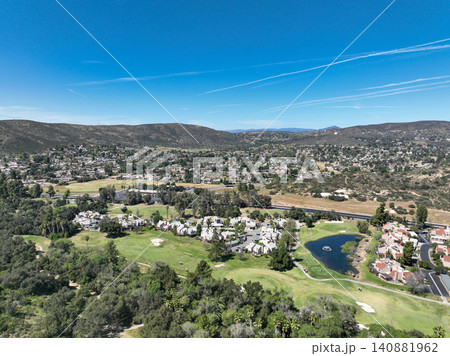 Aerial view of Ramona neighborhood with mountain, valley and golf course Aerial view of Ramona neighborhood with mountain, valley and golf course 140881962