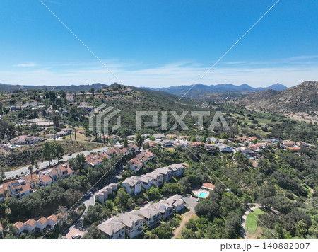 Aerial view of Ramona neighborhood with mountain, valley and golf course Aerial view of Ramona neighborhood with mountain, valley and golf course 140882007