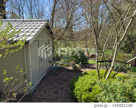 Enlgish green garden with multpiple type of trees and plants Enlgish green garden with multpiple type of trees and plants 140882186