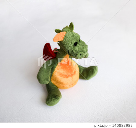 Stitched soft toy fabric on a white background. Animal toy. Stitched soft toy fabric on a white background. Animal toy. 140882985