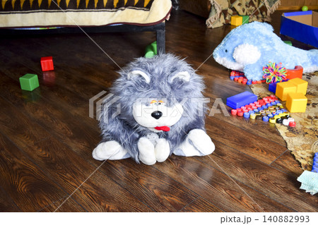Toy shaggy gray wolf. Toy shaggy gray wolf. 140882993