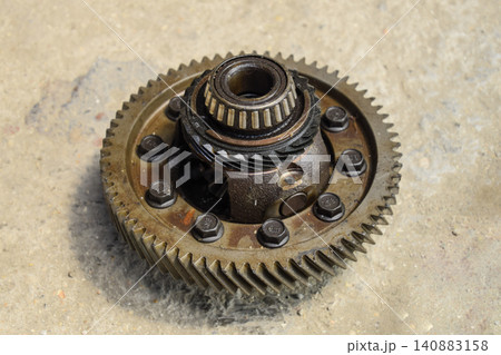 Dismantled box car transmissions. Gear with bearings. The gears on the shaft of a mechanical transmission. Dismantled box car transmissions. Gear with bearings. The gears on the shaft of a mechanical transmission. 140883158