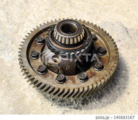 Dismantled box car transmissions. Gear with bearings. The gears on the shaft of a mechanical transmission. Dismantled box car transmissions. Gear with bearings. The gears on the shaft of a mechanical transmission. 140883167