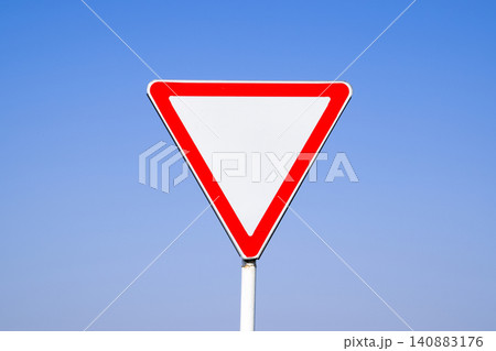 Road signs, give way. Sign on a blue background Road signs, give way. Sign on a blue background 140883176