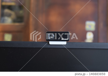 Web camera, attached to the monitor. Equipment for video Web camera, attached to the monitor. Equipment for video 140883850