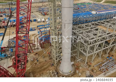 Installation of distillation column at an oil refinery. Installation of distillation column at an oil refinery. 140884035