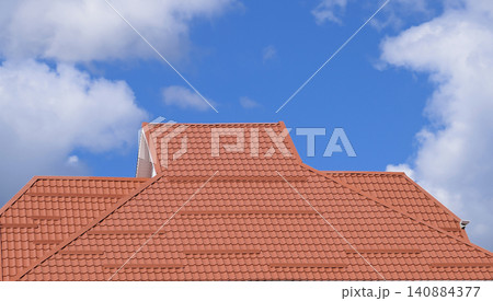 The roof of corrugated sheet red orange The roof of corrugated sheet red orange 140884377