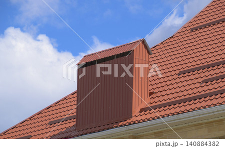 The roof of corrugated sheet red orange The roof of corrugated sheet red orange 140884382