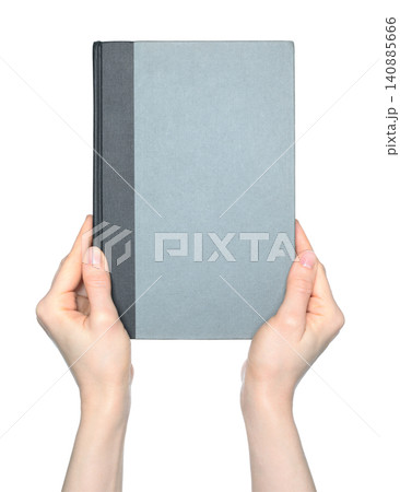 Hands holding a blank book with empty cover, isolated on transparent background. Clean mockup template for publishing, education, branding, presentation and design projects Hands holding a blank book with empty cover, isolated on transparent background. Clean mockup template for publishing, education, branding, presentation and design projects 140885666