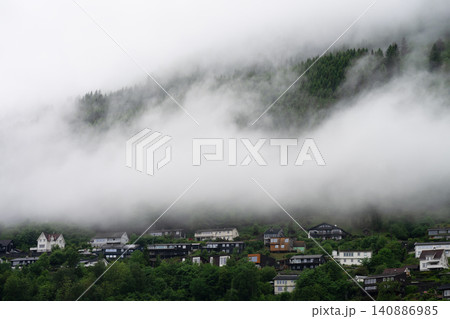 Houses in small settlements in the valleys of the magnificent Norwegian fjords Houses in small settlements in the valleys of the magnificent Norwegian fjords 140886985