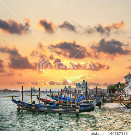 Amazing landscape of Riva degli Schiavoni with parked gondolas in Venice. 140887588