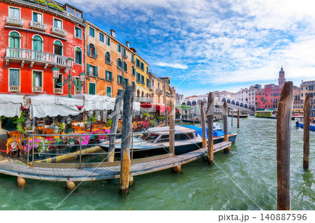 Remarkable morning cityscape of Venice with famous Canal Grande and colorful view of Rialto Bridge. Remarkable morning cityscape of Venice with famous Canal Grande and colorful view of Rialto Bridge. 140887596