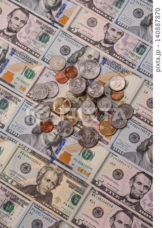 Paper US dollar bills of various denominations and cent coins as a business tool. Cash US dollars Paper US dollar bills of various denominations and cent coins as a business tool. Cash US dollars 140887870
