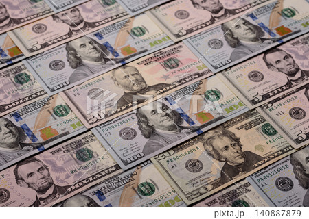 Paper US dollar bills of various denominations and cent coins as a business tool. Cash US dollars Paper US dollar bills of various denominations and cent coins as a business tool. Cash US dollars 140887879